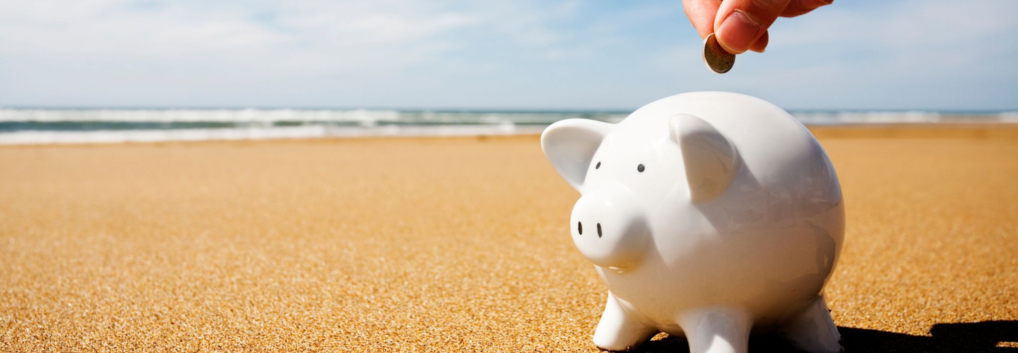 piggie bank on a beach holiday pay for part-time workers GBH Law